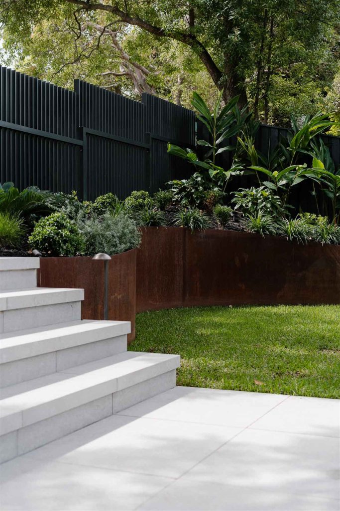 Corten steel retaining wall for garden design consultation